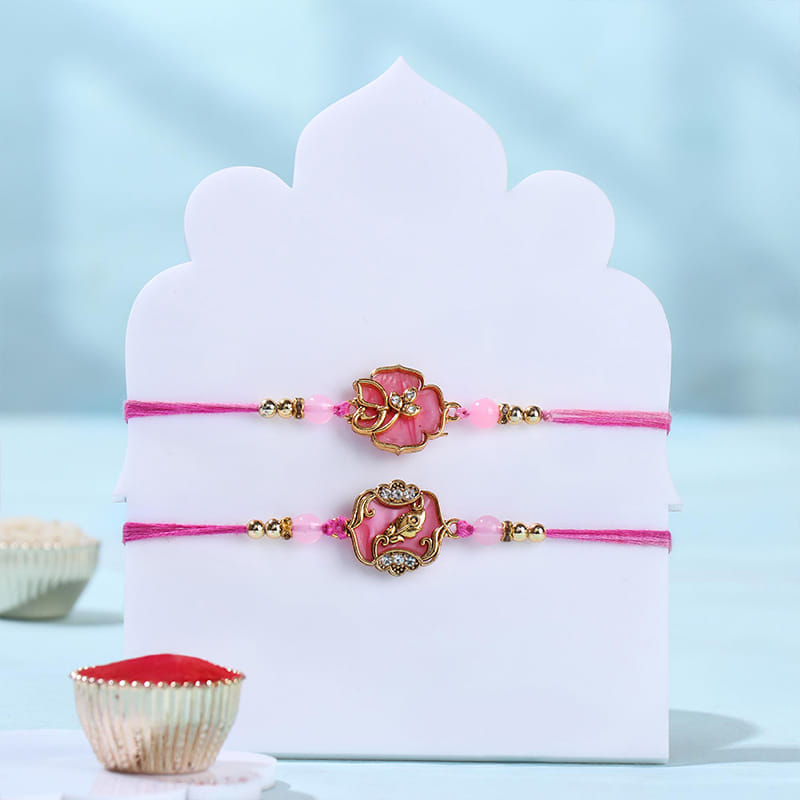 Two Purple Rakhis With Kaju Katli