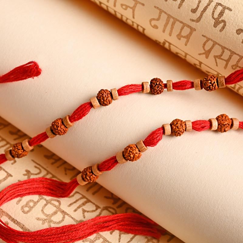 Order Rudraksh Rakhi for Brother online - Two Rudraksha Red Rakhis