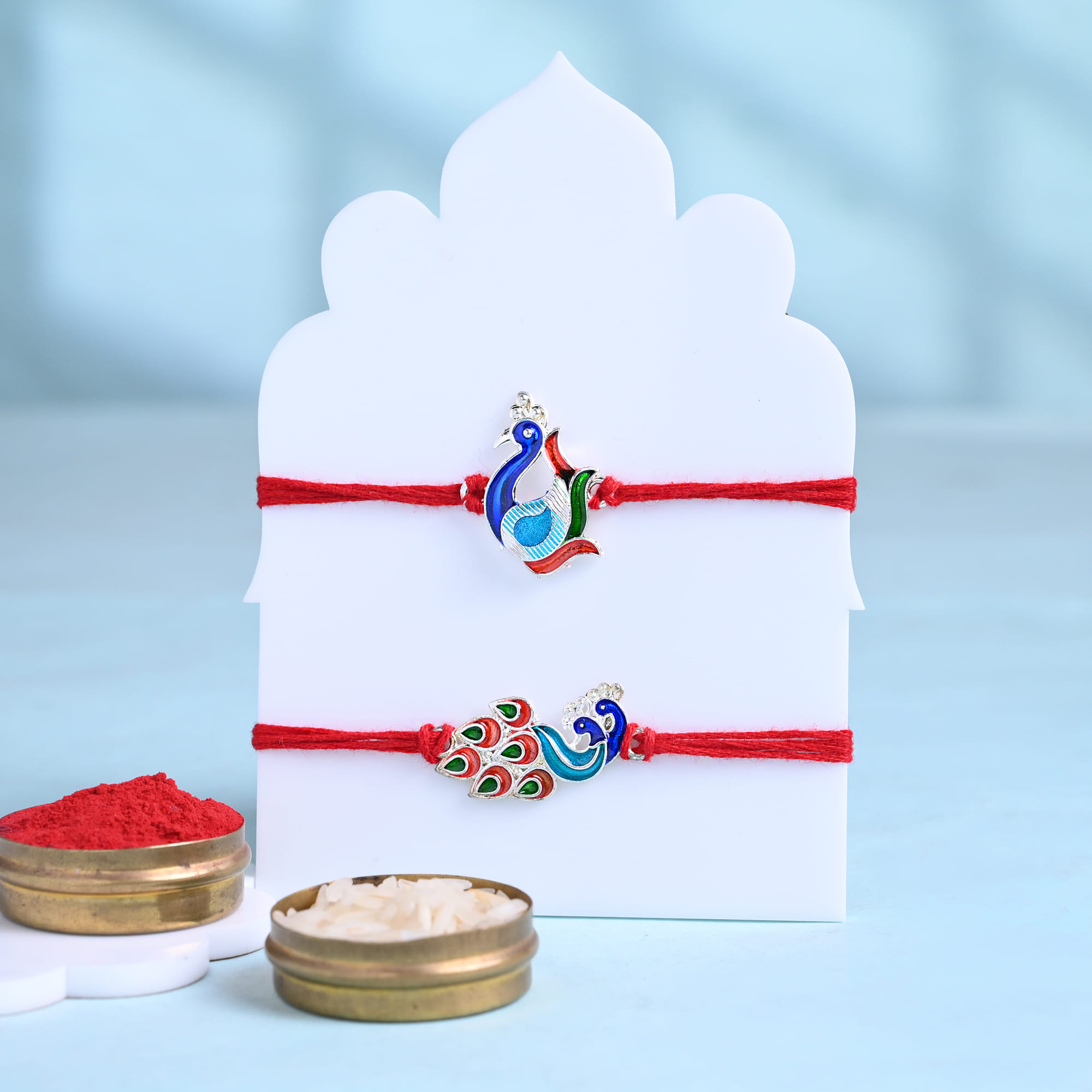 Two Sapphire Peacock Rakhi With Silk Chocolates