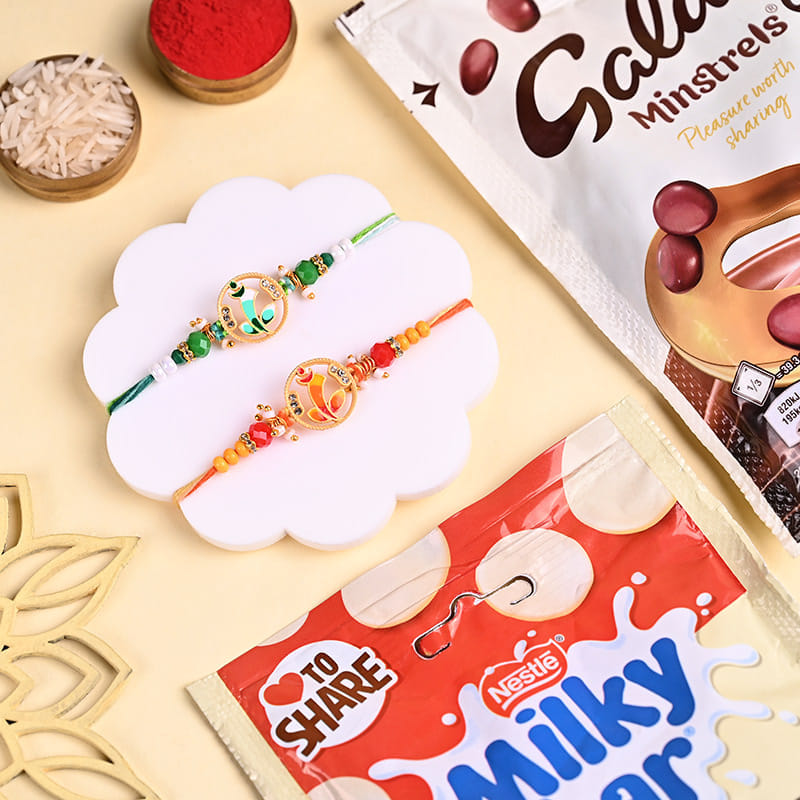 Two Vibrant Ganesha Rakhis With Choco Treats