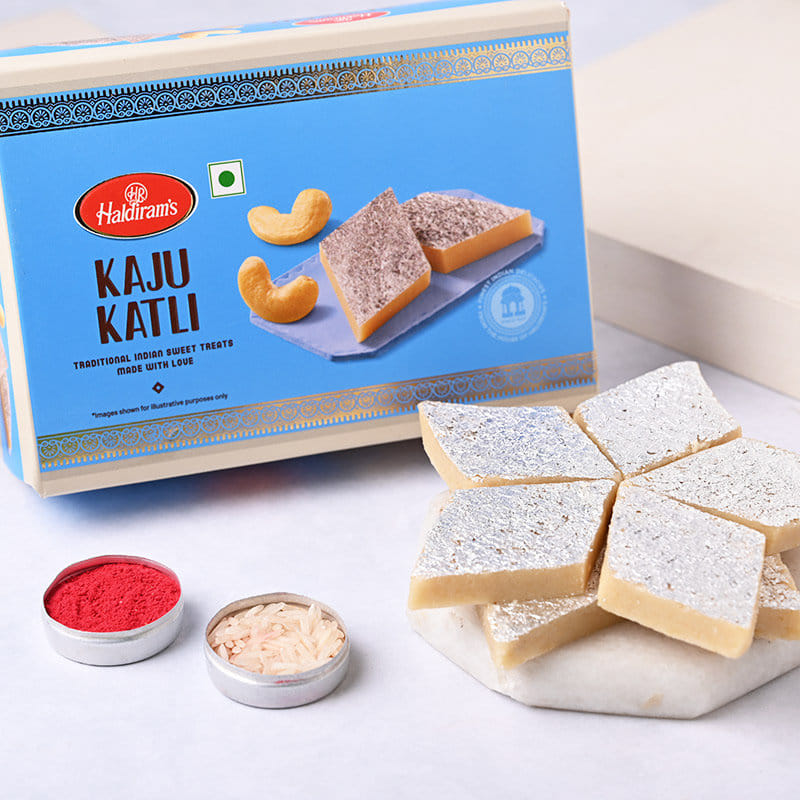 Two Yellow N Blue Rakhis With Haldirams Kaju Katli