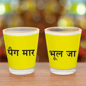 Pair of yellow printed shot glasses