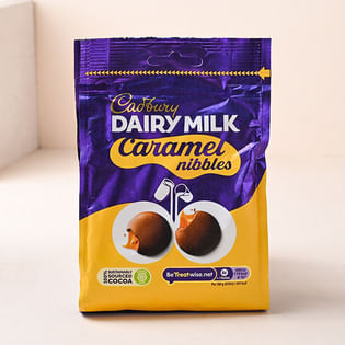 Buy Bhaiya Bhabhi Rakhi Set With Cadbury Nibbles in UK