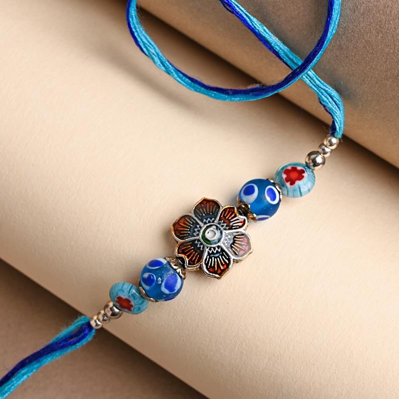 Send Fancy Rakhi for Brother - Vibrant Blooming Rakhi online