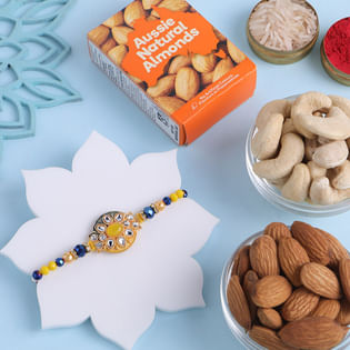 Vibrant Designer Rakhi With Nutty Treats