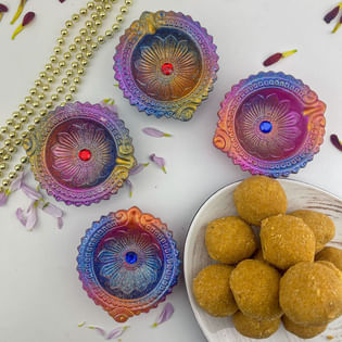 Vibrant Festive Diyas N Besan Ladoo