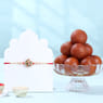 Vibrant Floral Rakhi With Gulab Jamun