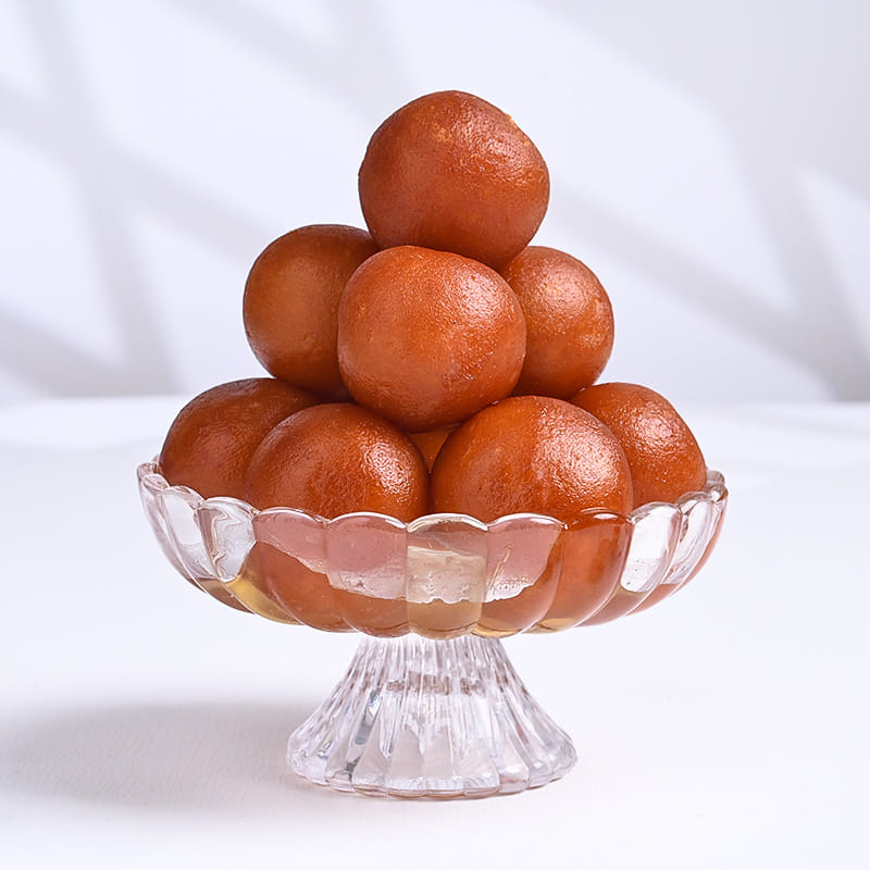 Vibrant Floral Rakhi With Gulab Jamun