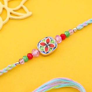 Vibrant Floral Rakhi With Pastel Threads