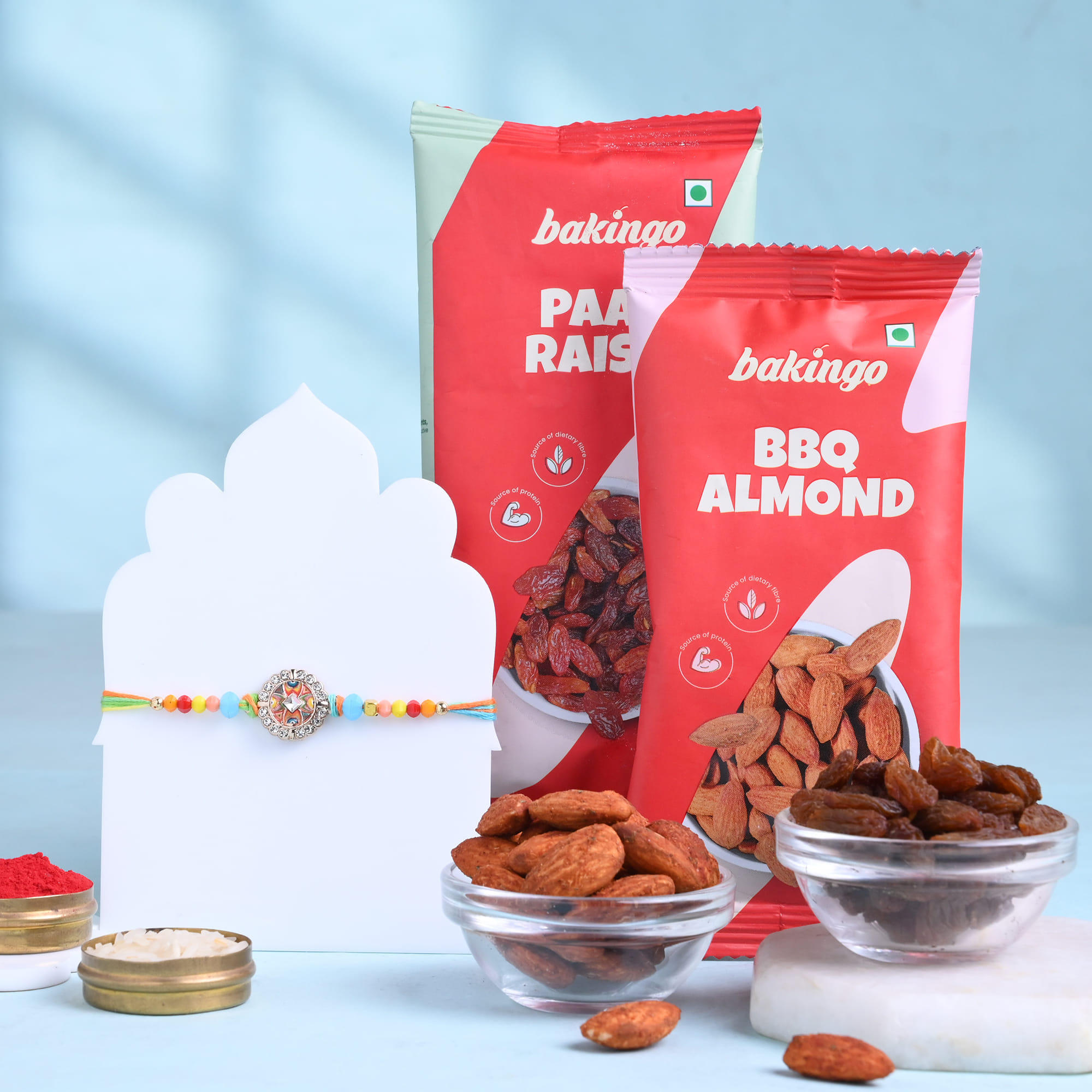 Vibrant Floral Rakhi With Raisins N Almonds