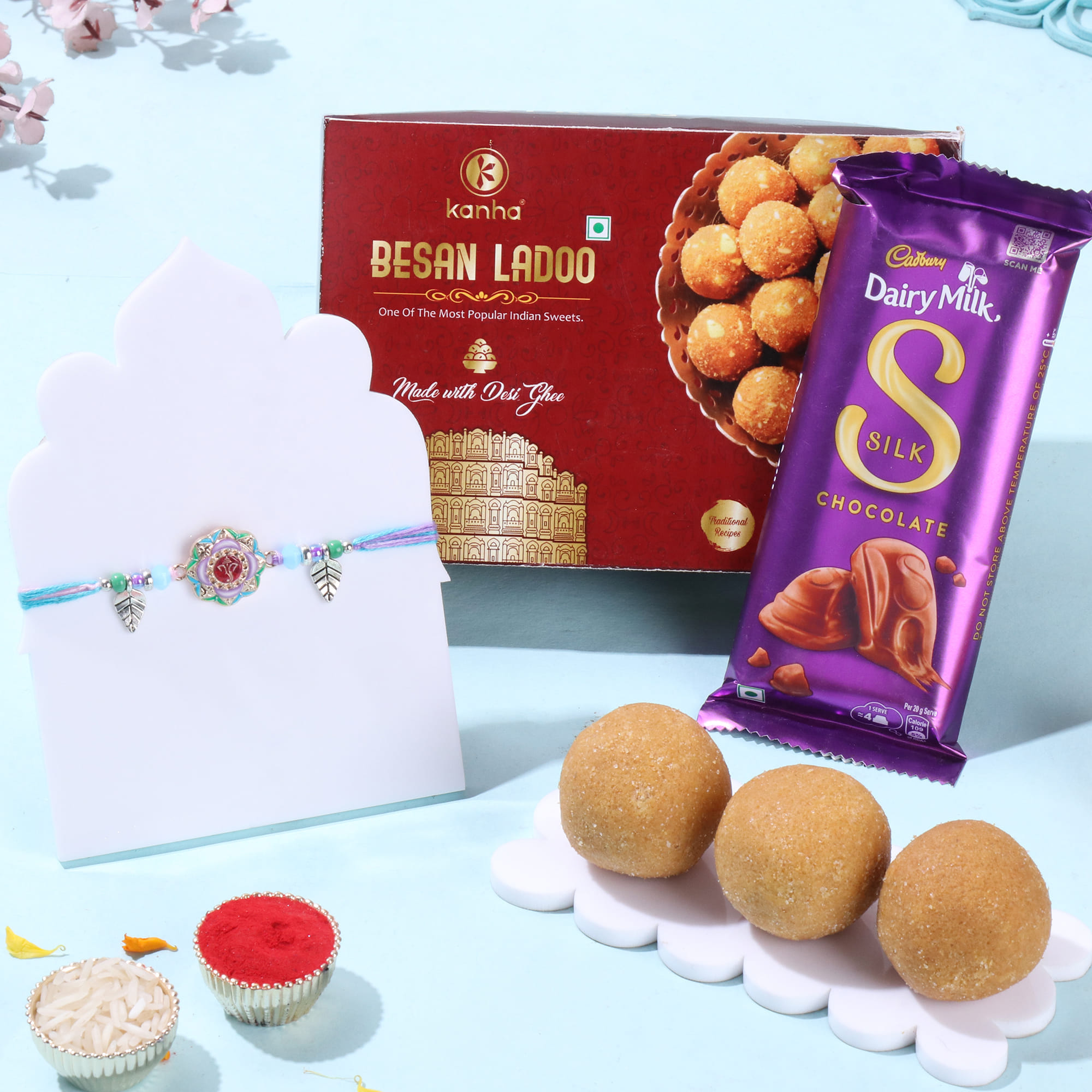 Vibrant Ganesha Rakhi With Ladoos N Chocolate
