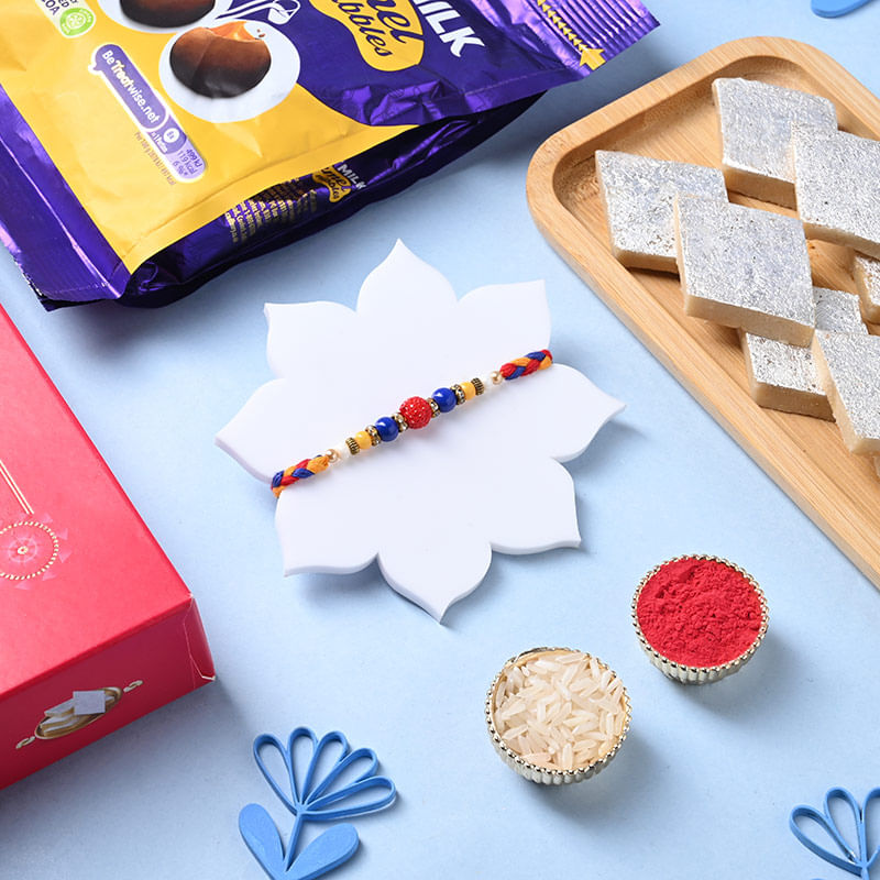 Mauli Rakhi With Kaju Katli N Cadbury Nibbles