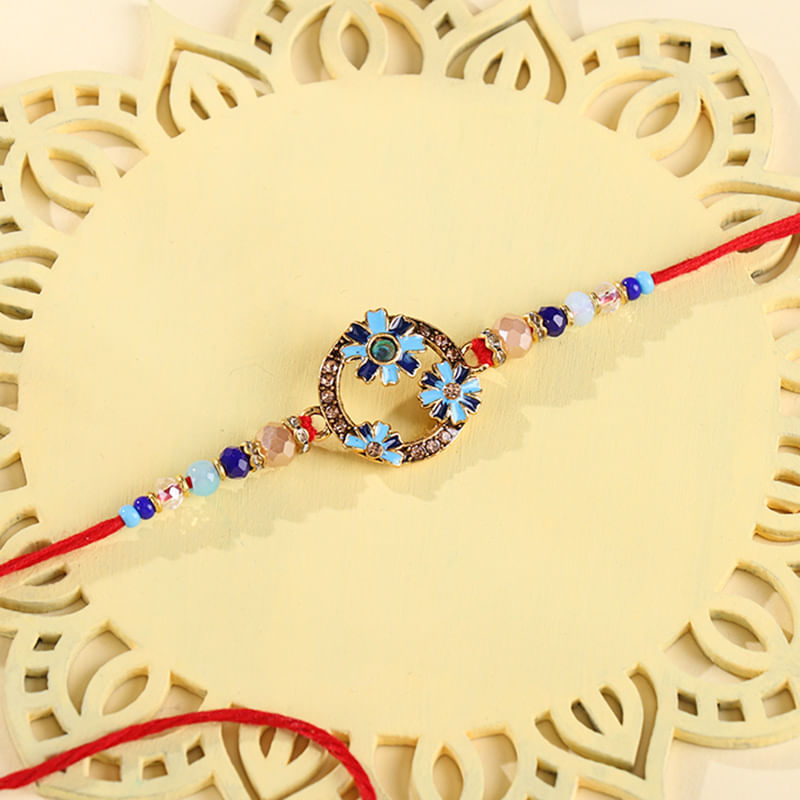 Vibrant Stone Studded Kundan Rakhi With Haldiram Rasgulla