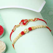 Order Vibrantly Unique Red N White Rakhis For Brother