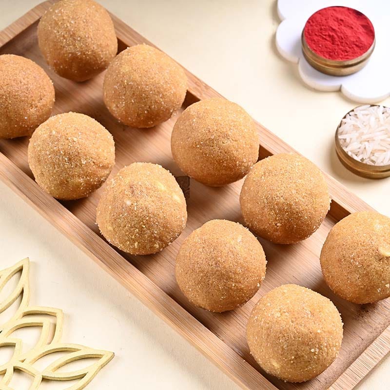 Ornate Ganesha Rakhi With Besan Ladoo