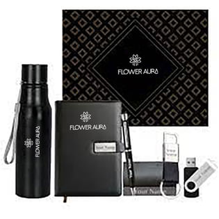 A black notebook, pen, bottle and pen drive 