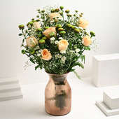 Arrangement of 8 Peach Roses and 6 green and White Daisy in Vase