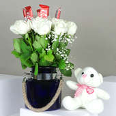 5 KitKat Chocolate with 20 White Roses in Blue Glass Vase