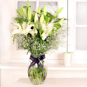 White Lily Breath - Arrangement of 7 White Lilies in Glass Vase