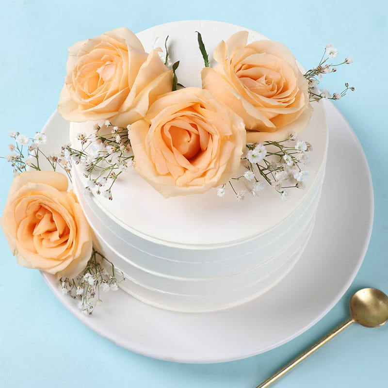 White N Peach Blooms Cake