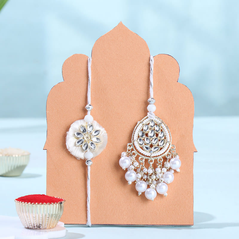 White Pearl Bhai Bhabhi Rakhis With Besan Ladoos