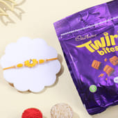 Yellow Lotus Rakhi N Choco Twirl Bites