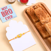 Yellow Lotus Rakhi With Milk Cake